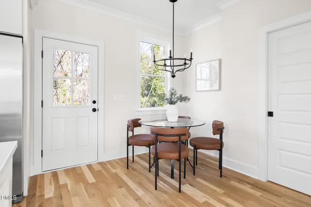 a view of a dining room with furniture