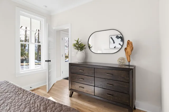 a area with cabinets and a window