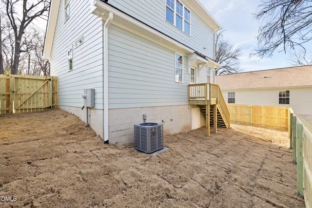 a view of a backyard of the house