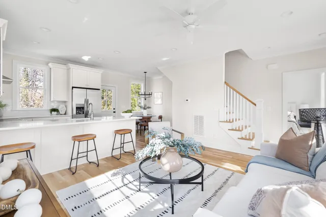 a kitchen with a dining table and chairs