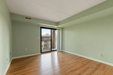 a view of street with large trees