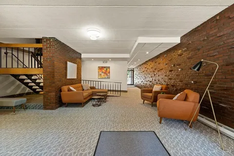 a bedroom with furniture and a couch