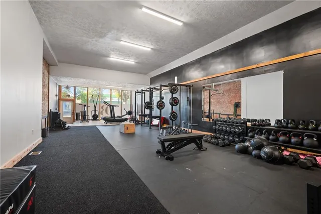 a bathroom with a sink toilet and a mirror