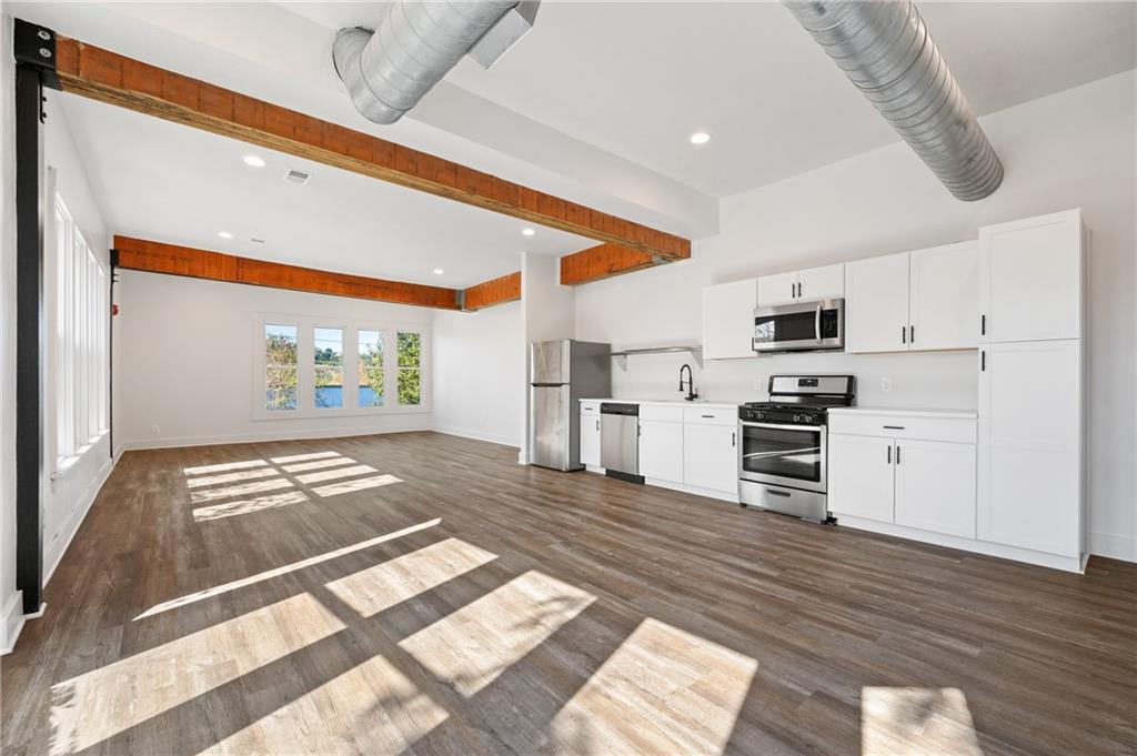 200 East 8th Avenue Homestead, PA 15120 - Photo 29 of 50 a view of a kitchen with wooden floor and electronic appliances