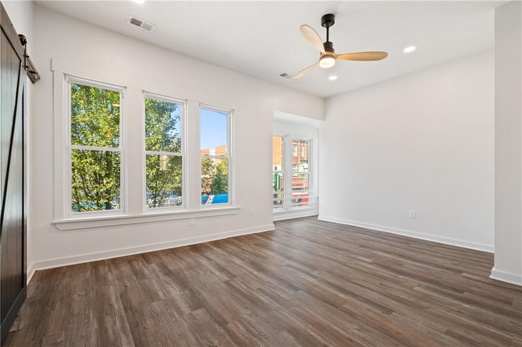 200 East 8th Avenue Homestead, PA 15120 - Photo 32 of 50 wooden floor in an empty room with a window