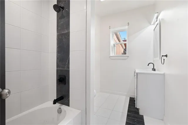 a view of a bathroom with a bathtub