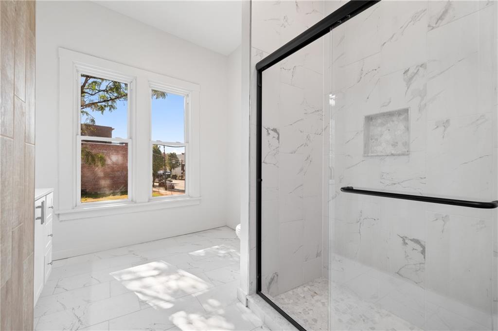 200 East 8th Avenue Homestead, PA 15120 - Photo 38 of 50 a view of a bathroom with a bathtub