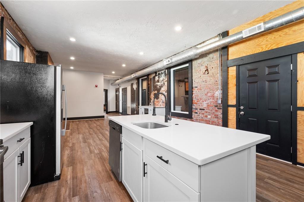 200 East 8th Avenue Homestead, PA 15120 - Photo 42 of 50 a kitchen with a sink and refrigerator