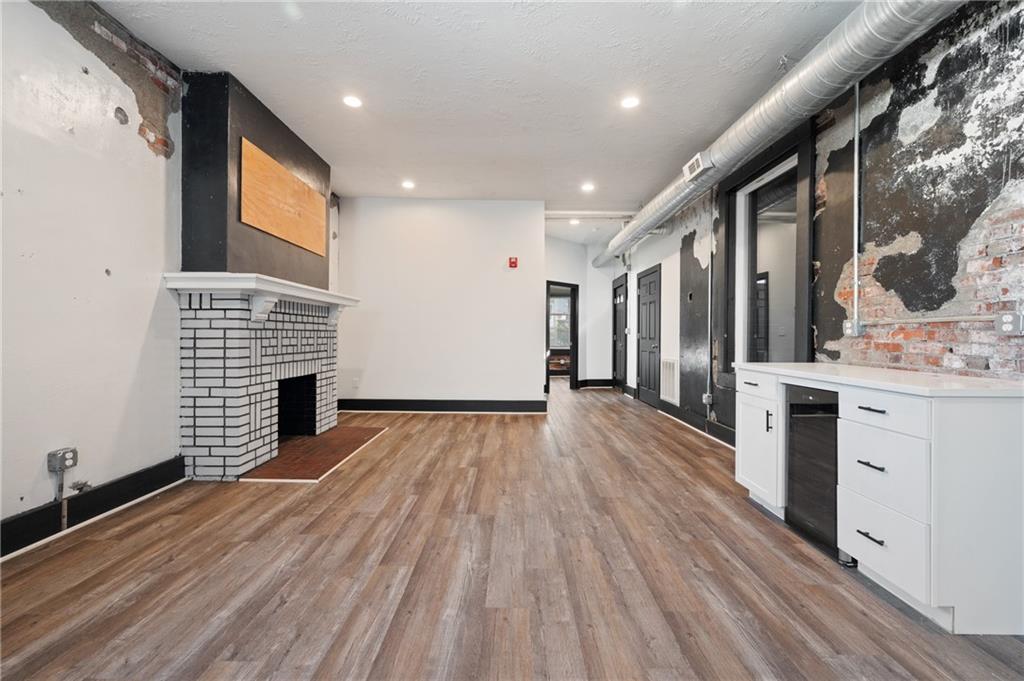 200 East 8th Avenue Homestead, PA 15120 - Photo 44 of 50 a view of kitchen with cabinets and wooden floor