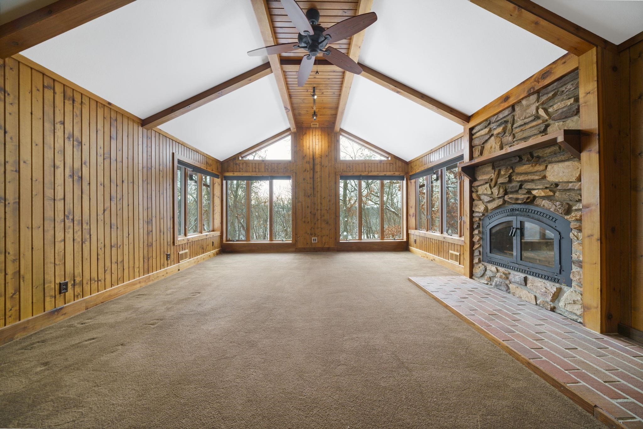1203 West Mud Creek Road Oregon, IL 61061 - Photo 18 of 67 a view of a livingroom with a fireplace and furniture