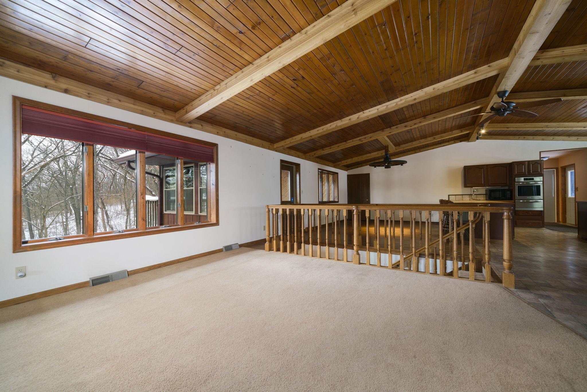 1203 West Mud Creek Road Oregon, IL 61061 - Photo 21 of 67 a view of an empty room with a balcony