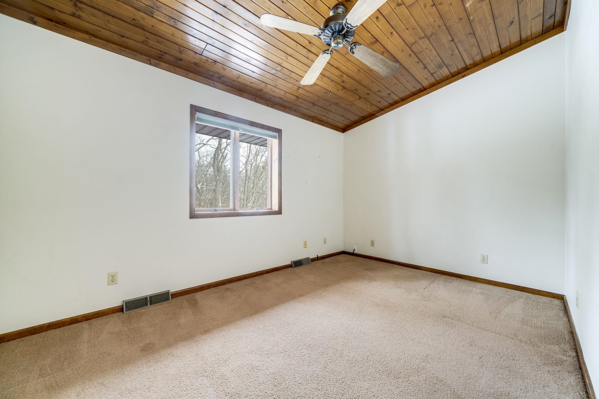 1203 West Mud Creek Road Oregon, IL 61061 - Photo 22 of 67 an empty room with windows