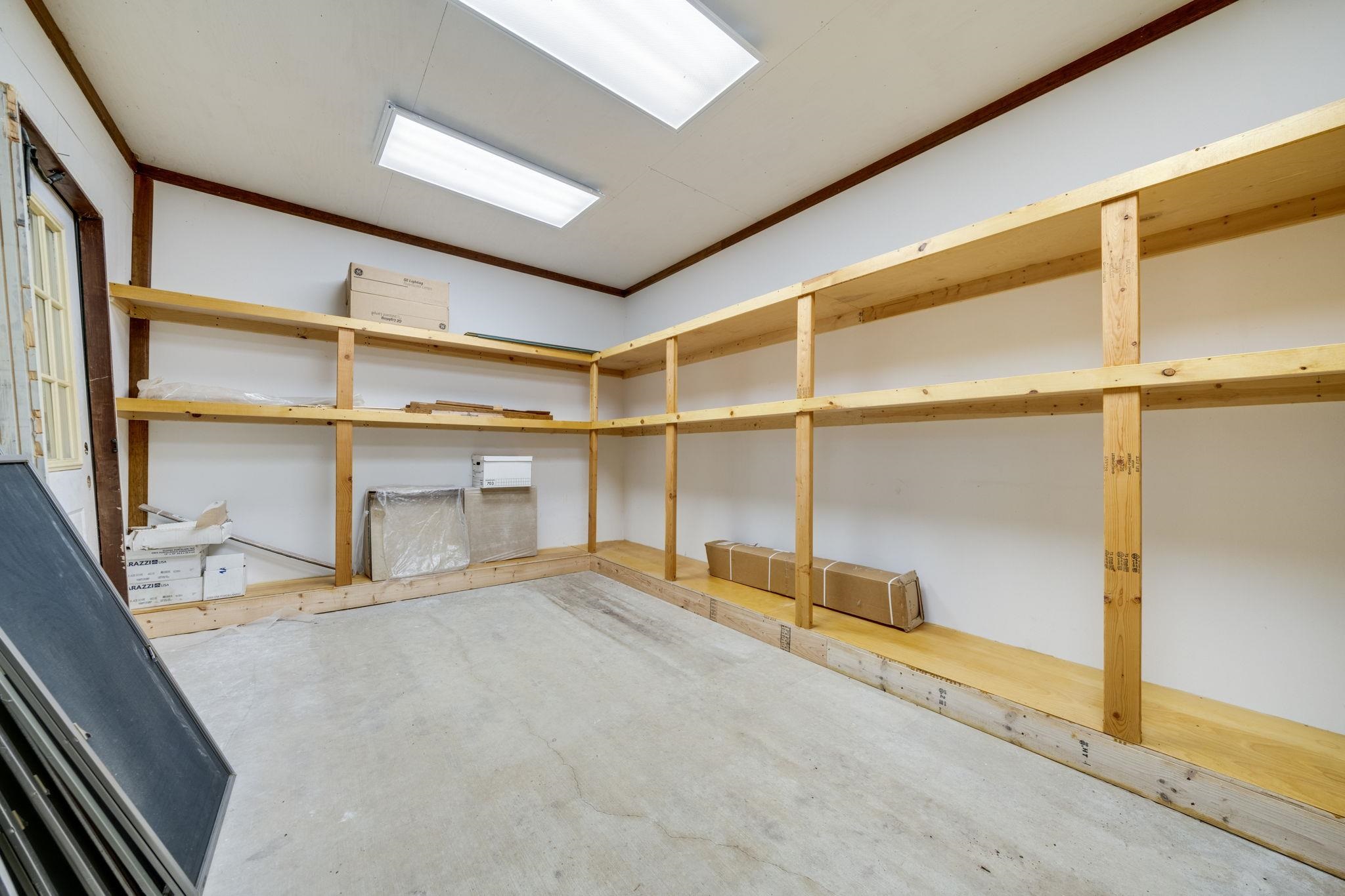 1203 West Mud Creek Road Oregon, IL 61061 - Photo 34 of 67 a view of an empty room with wooden floor and windows