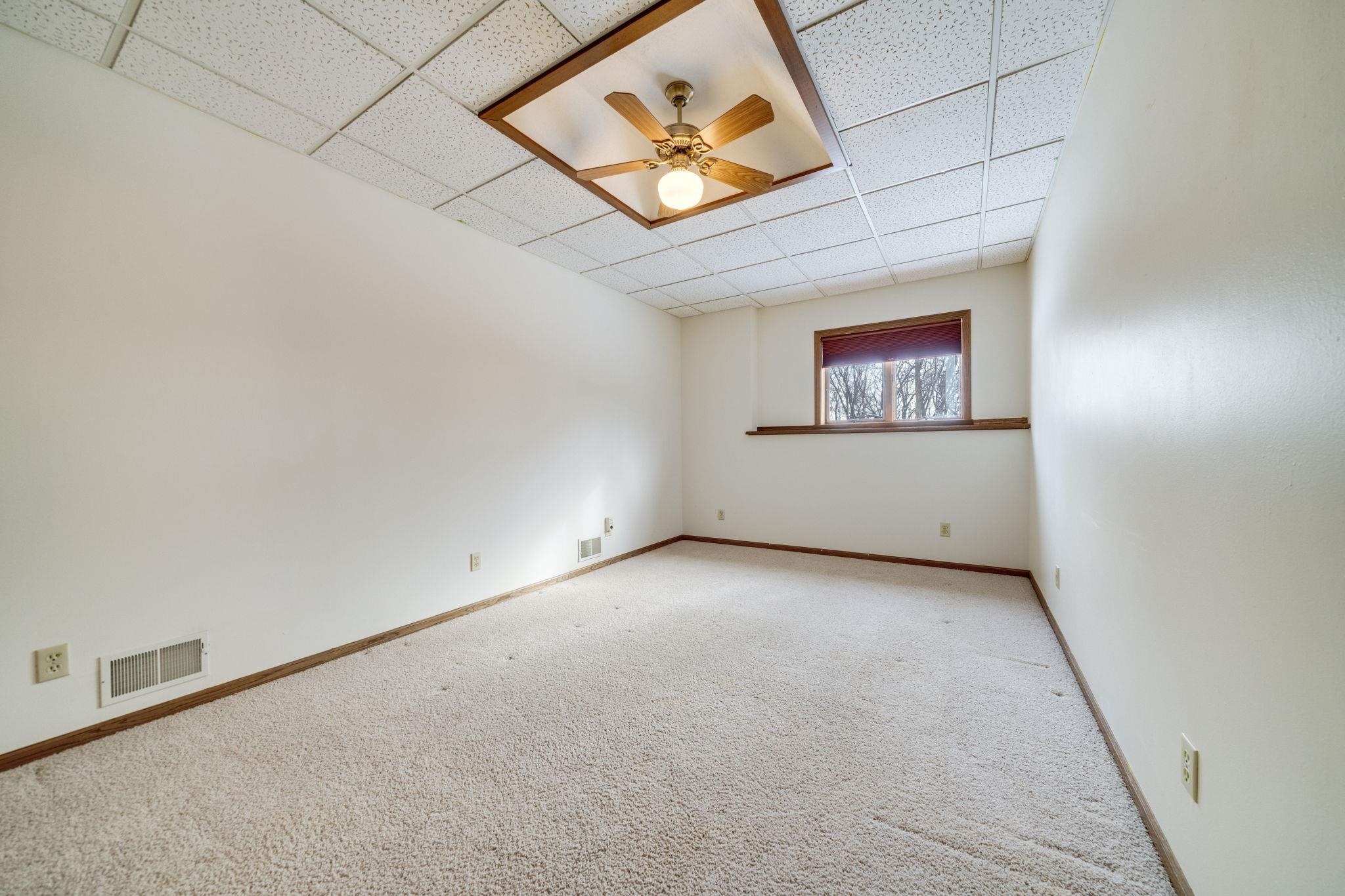1203 West Mud Creek Road Oregon, IL 61061 - Photo 36 of 67 an empty room with a hallway