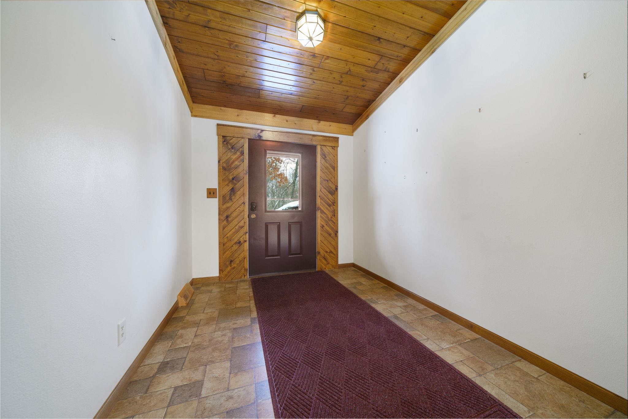 1203 West Mud Creek Road Oregon, IL 61061 - Photo 42 of 67 a view of hallway with wooden floor