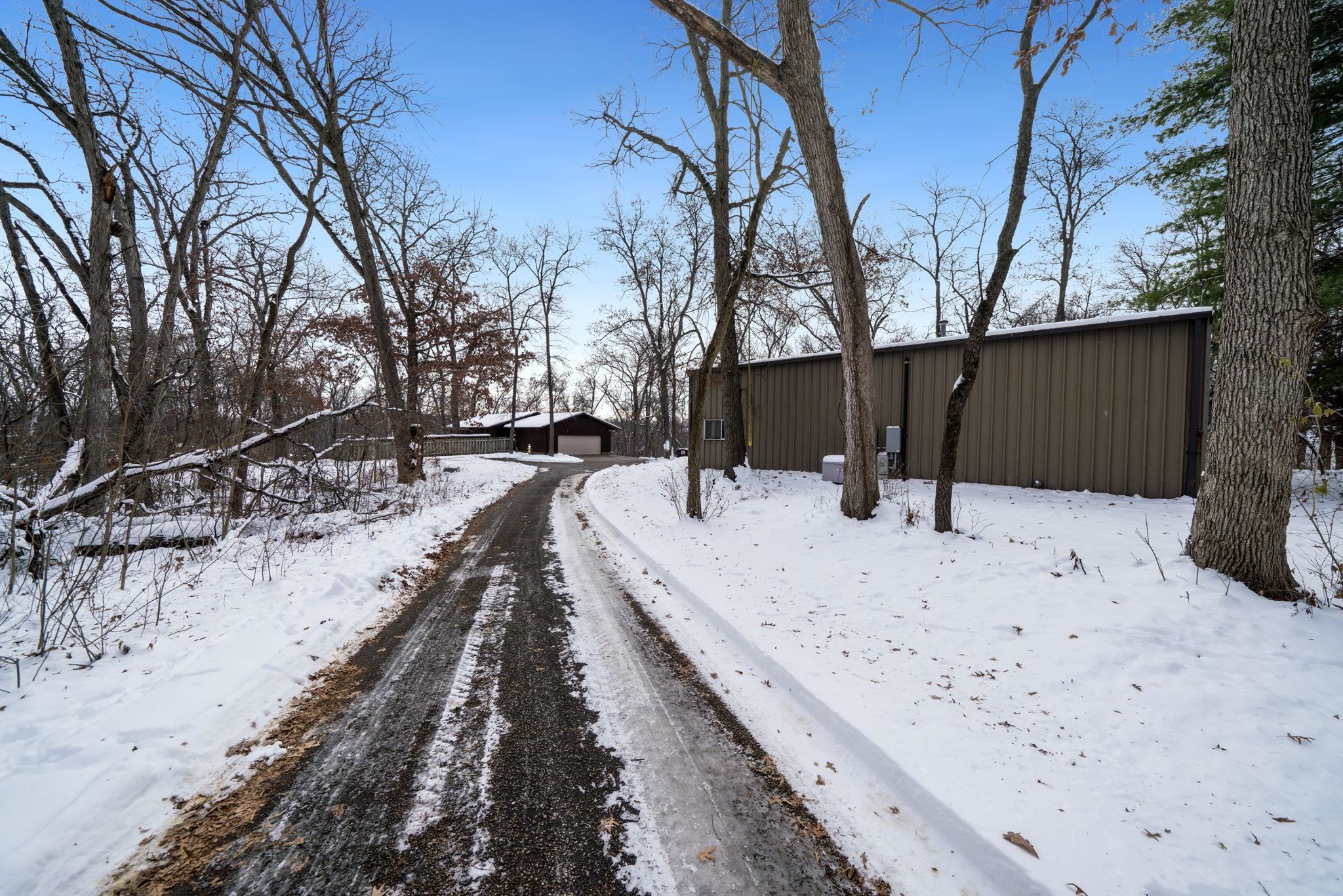 1203 West Mud Creek Road Oregon, IL 61061 - Photo 55 of 67 a view of a backyard of snow