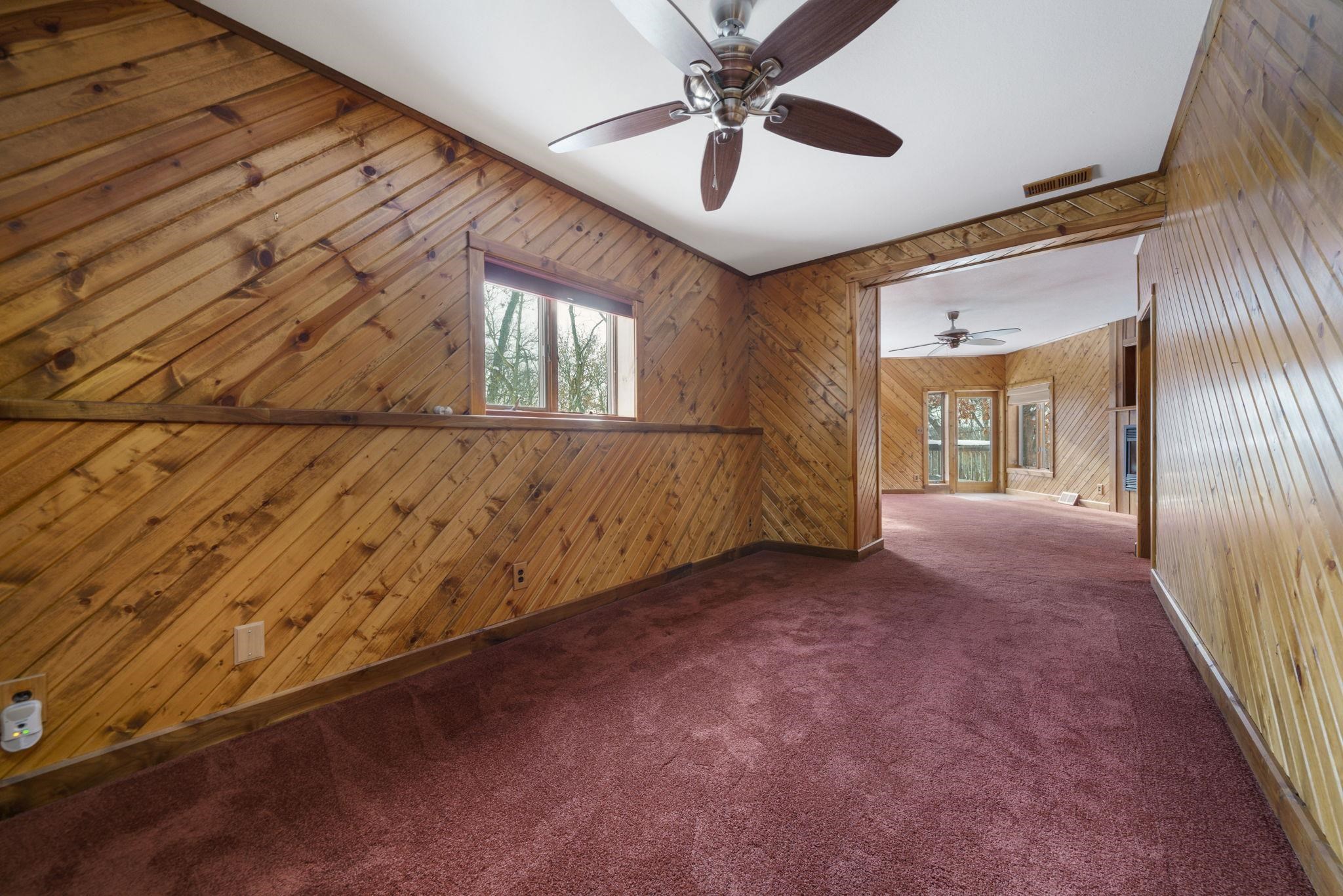 1203 West Mud Creek Road Oregon, IL 61061 - Photo 7 of 67 wooden floor in an empty room with a window