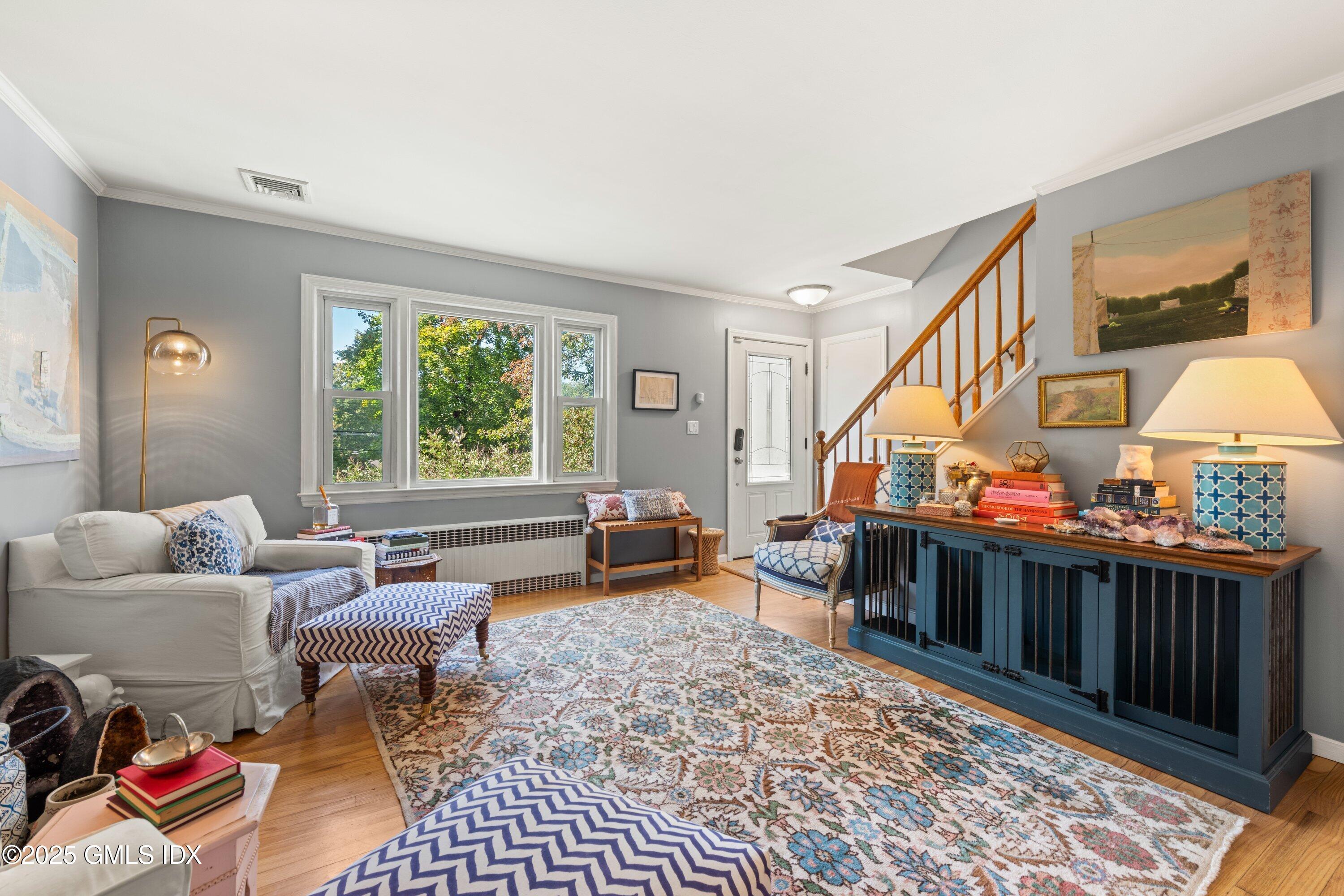 3 Green Lane Greenwich, CT 06831 - Photo 12 of 24 a living room with furniture and a window