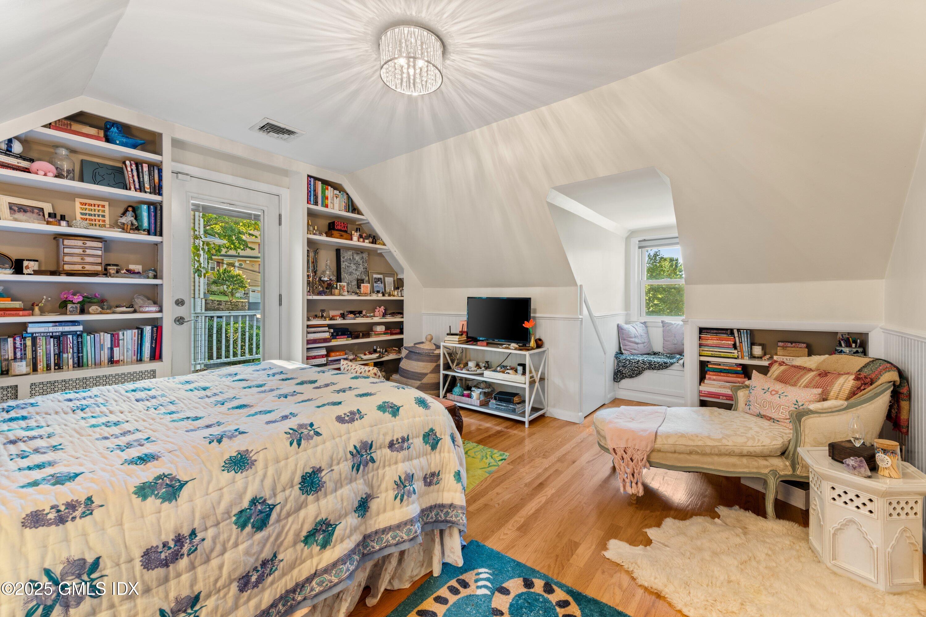 3 Green Lane Greenwich, CT 06831 - Photo 20 of 24 a bedroom with bed and a flat tv screen