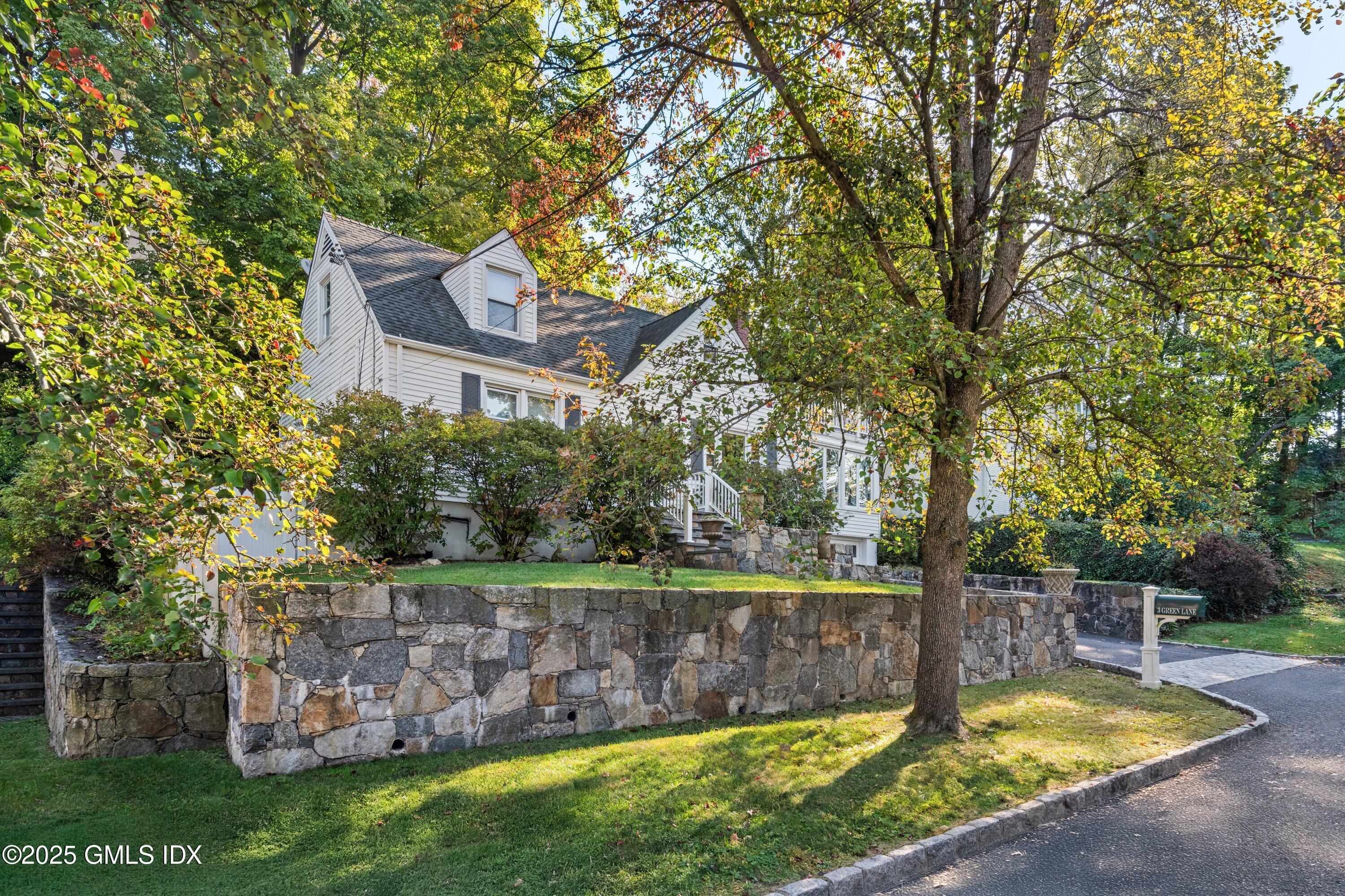 3 Green Lane Greenwich, CT 06831 - Photo 2 of 24 a view of a swimming pool with a patio