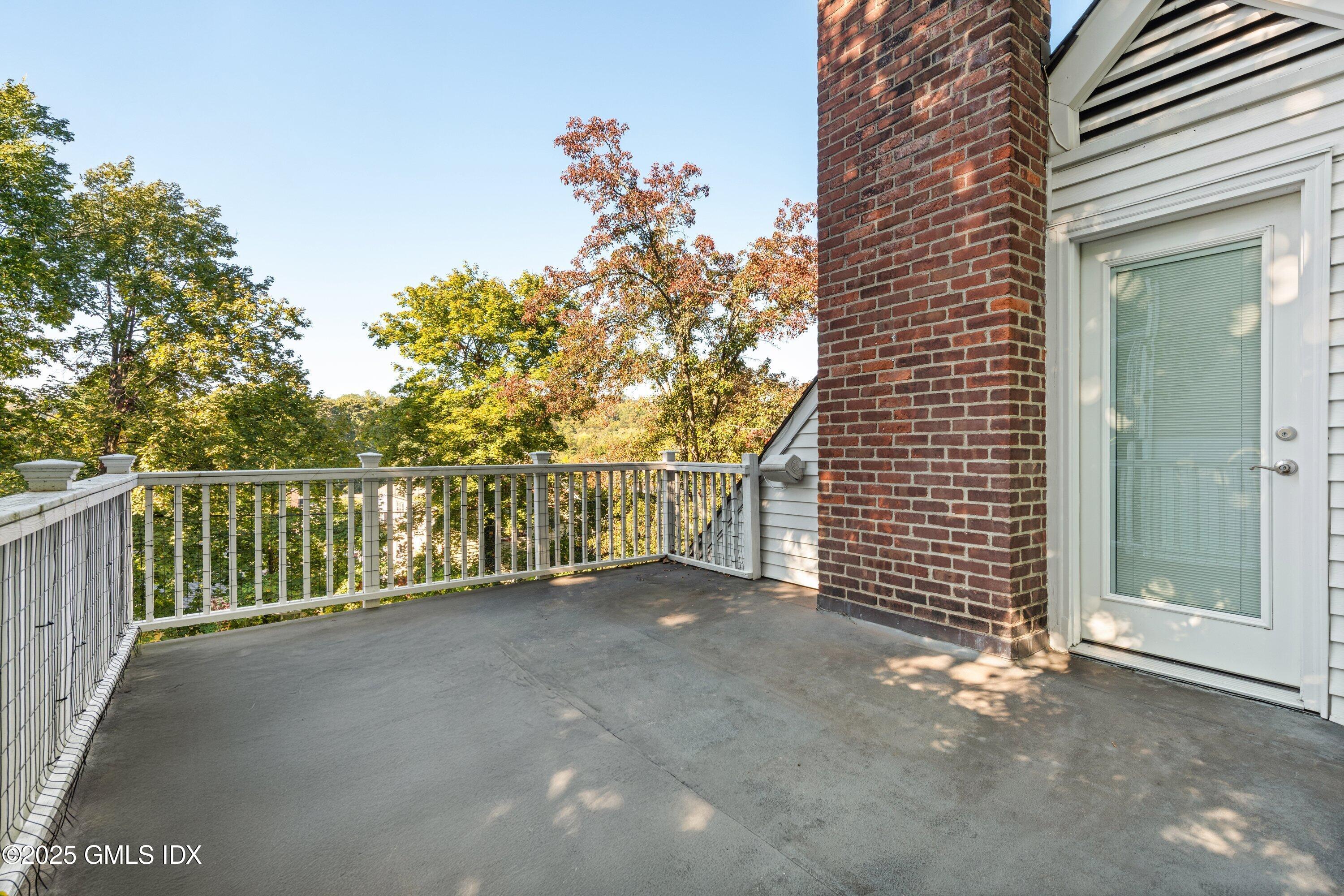 3 Green Lane Greenwich, CT 06831 - Photo 8 of 24 a view of a balcony with an outdoor space