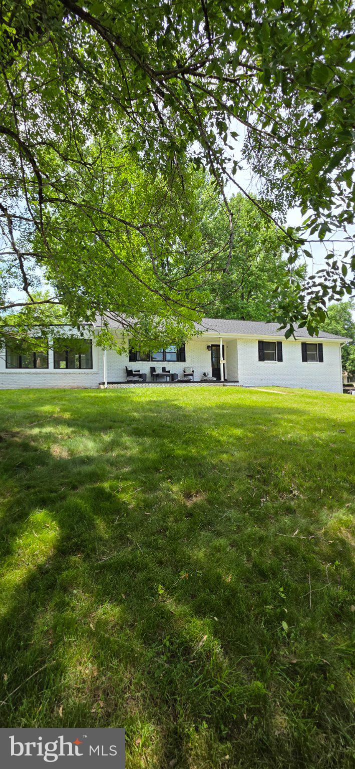 5141 Turkey Point Road North East, MD 21901 - Photo 1 of 64 Charming home nestled in lush greenery.