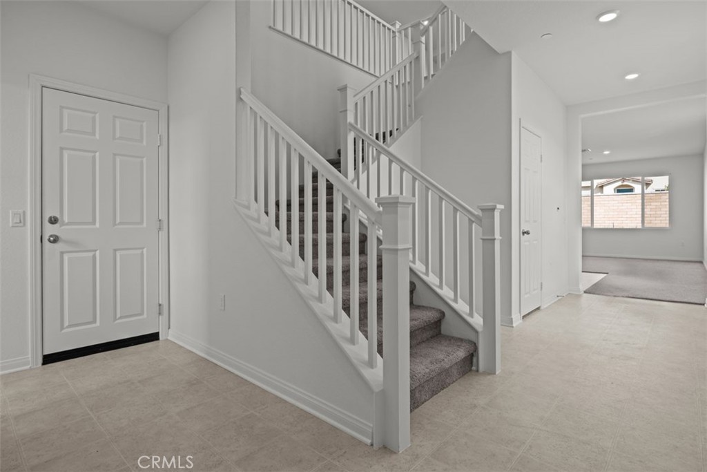 25632 Ranch House Road Homeland, CA 92548 - Photo 2 of 26 a view of staircase with white walls and white walls