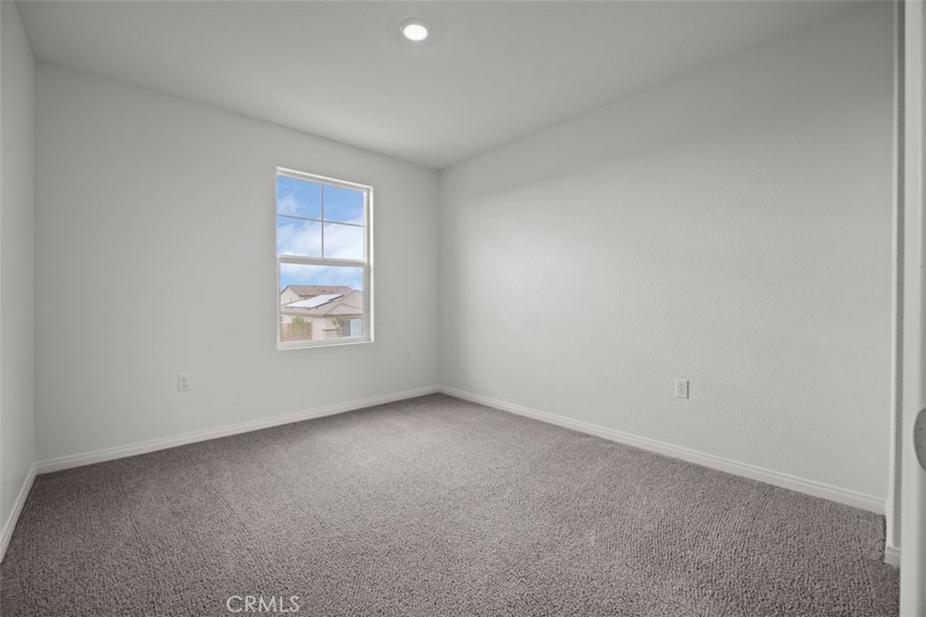 25632 Ranch House Road Homeland, CA 92548 - Photo 6 of 26 an empty room with a window