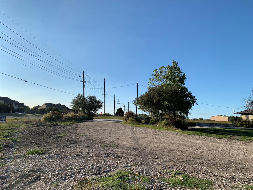 5811 Horizon & 00 Ranch Trail Road Rockwall, TX 75032 - Photo 14 of 18 a view of a street with a car parked in the background