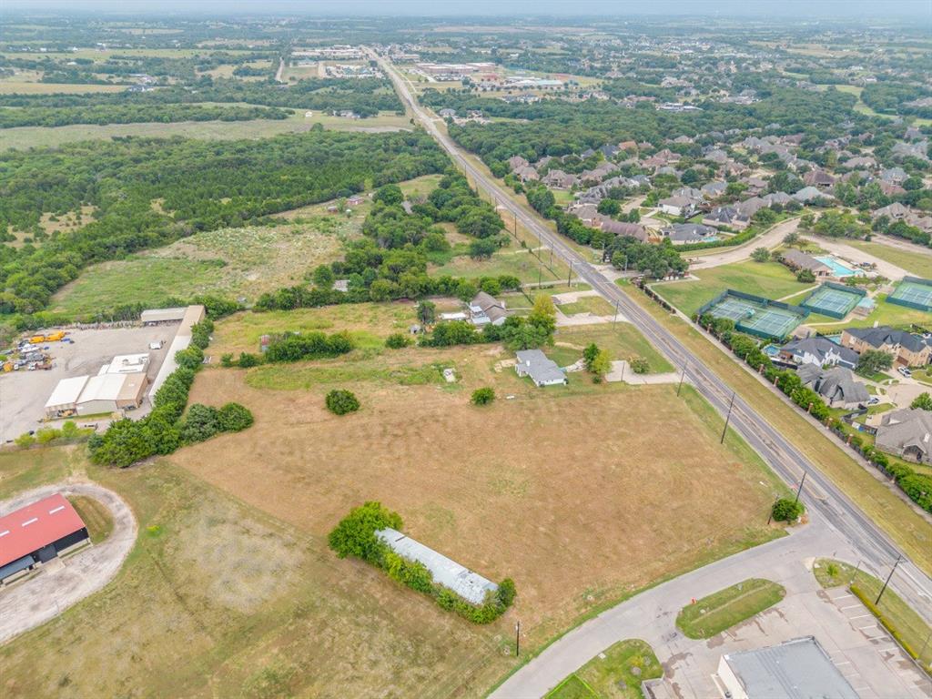 5811 Horizon & 00 Ranch Trail Road Rockwall, TX 75032 - Photo 5 of 18 an aerial view of residential houses with outdoor space