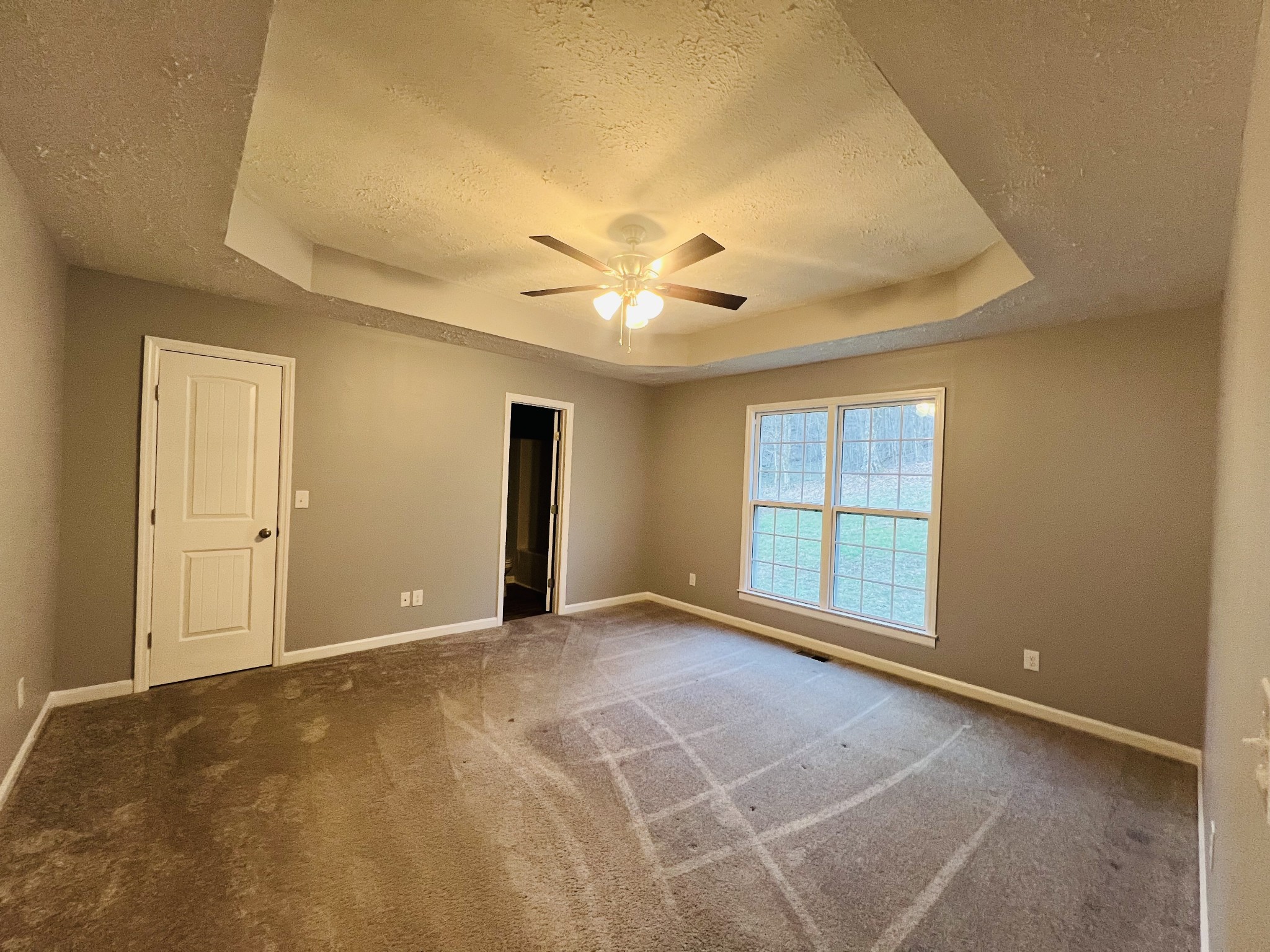 750 Bunker Hill Road Pulaski, TN 38478 - Photo 20 of 36 a view of an empty room with a window