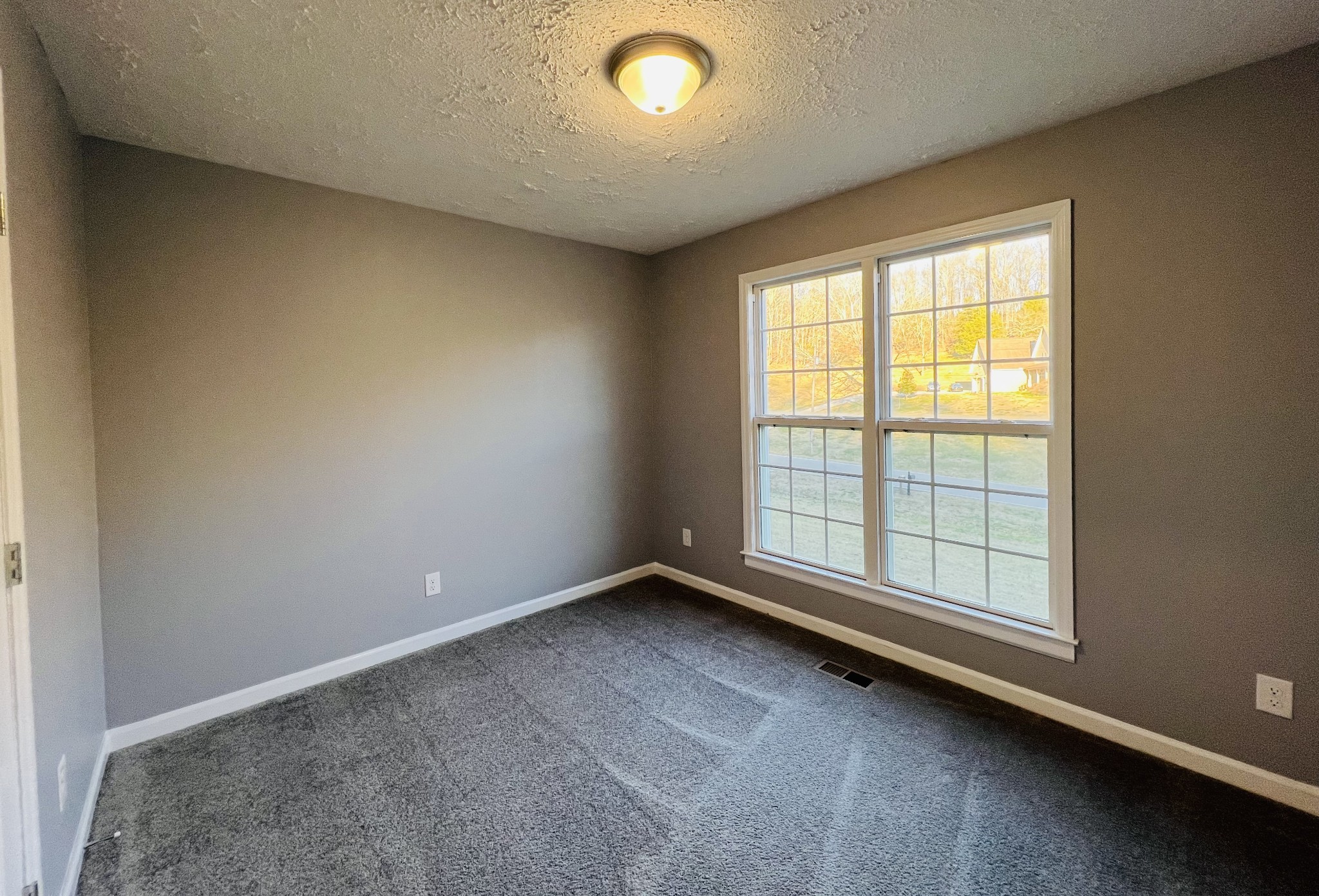 750 Bunker Hill Road Pulaski, TN 38478 - Photo 32 of 36 an empty room with a window