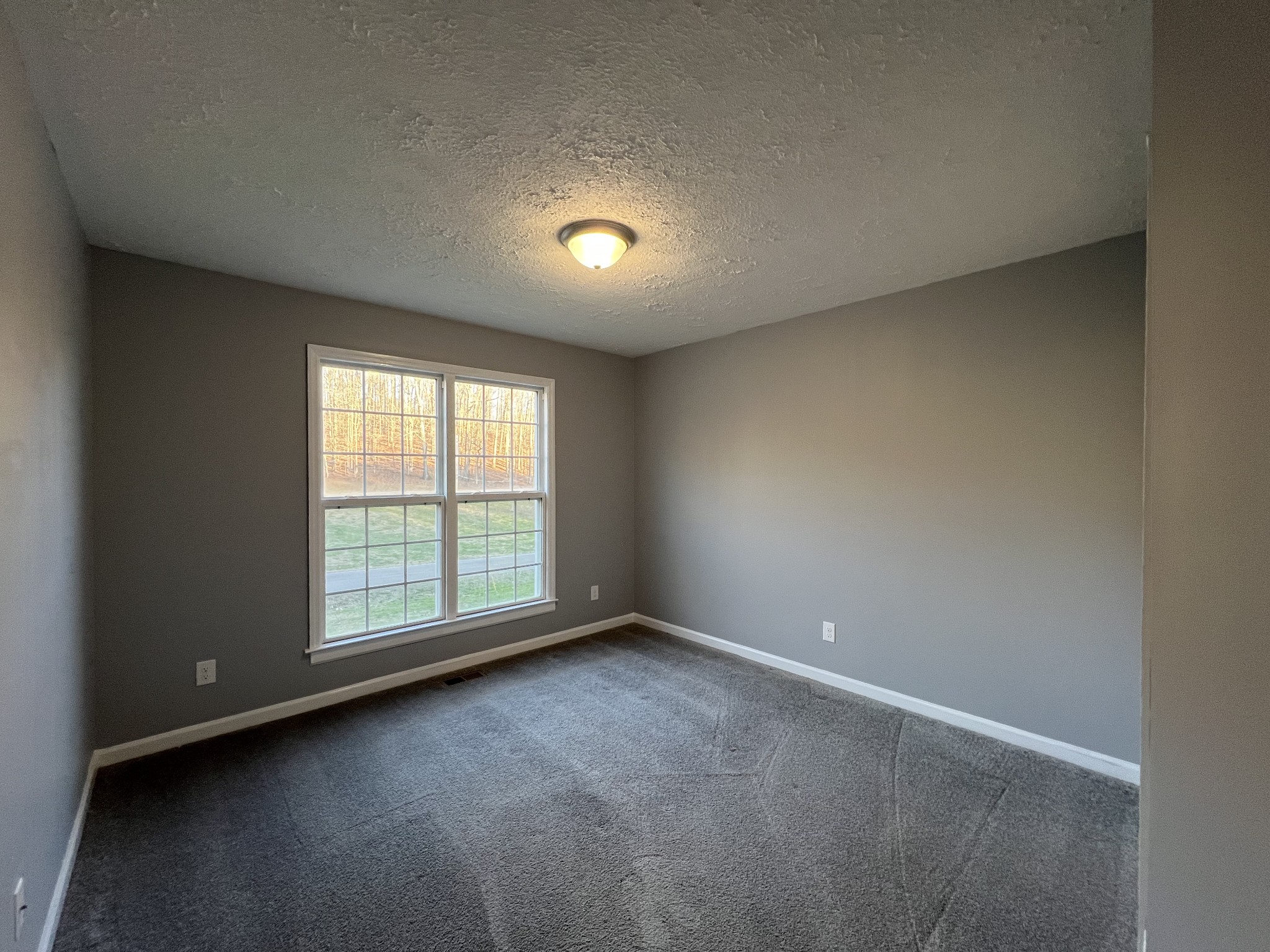 750 Bunker Hill Road Pulaski, TN 38478 - Photo 34 of 36 an empty room with a window