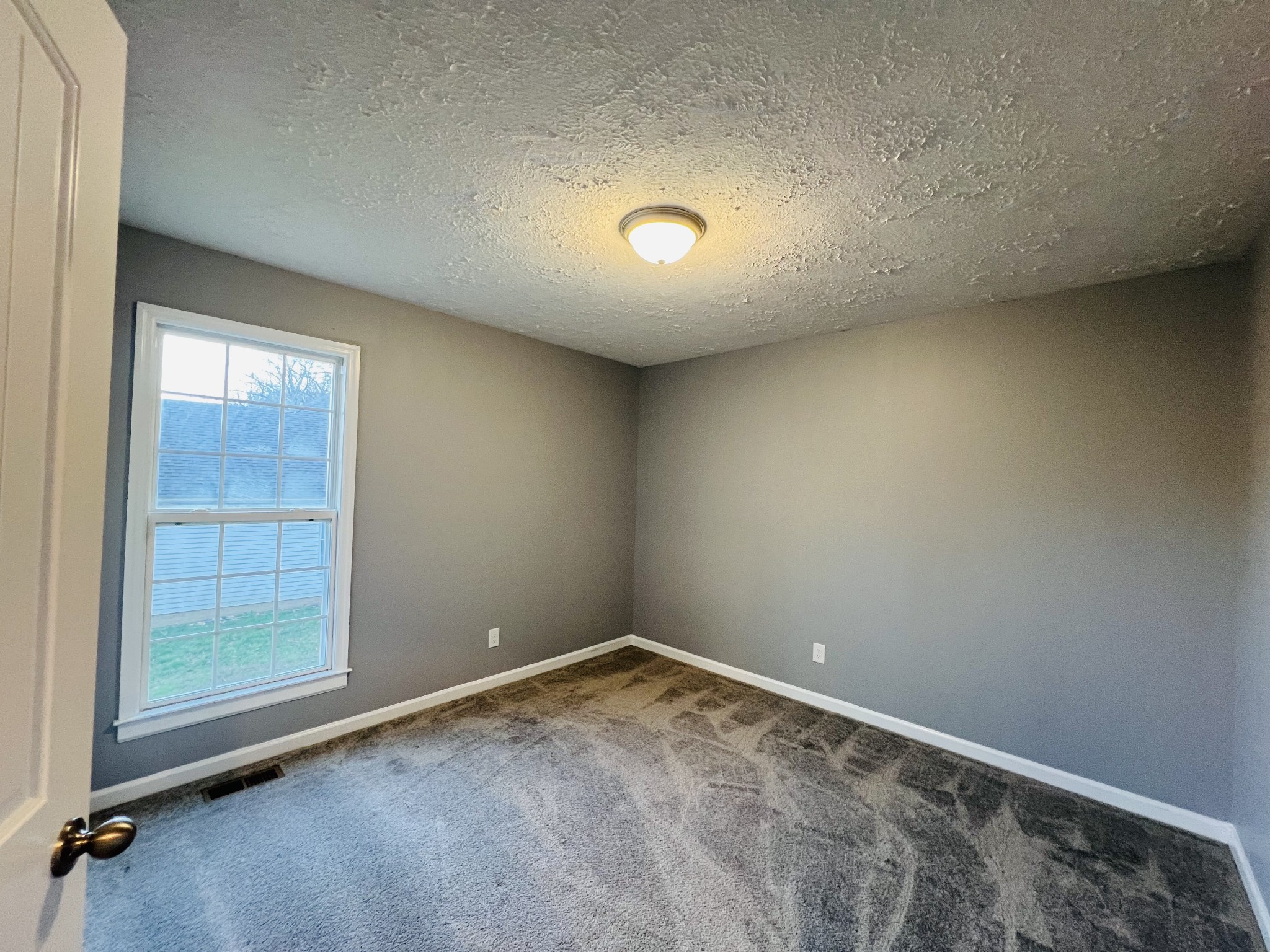 750 Bunker Hill Road Pulaski, TN 38478 - Photo 35 of 36 an empty room with windows