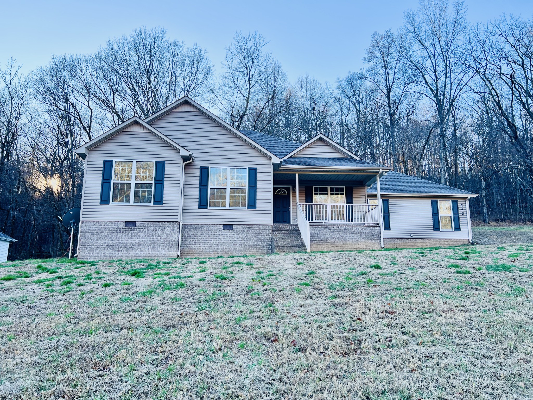 750 Bunker Hill Road Pulaski, TN 38478 - Photo 5 of 36 a front view of a house with garden