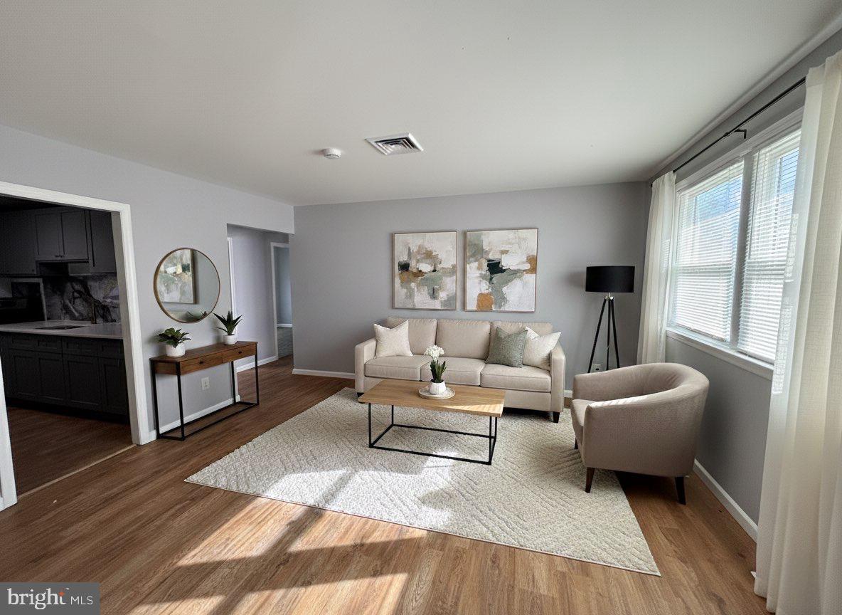 164 Kinsley Road Pemberton, NJ 08068 - Photo 2 of 15 a living room with furniture and a couch
