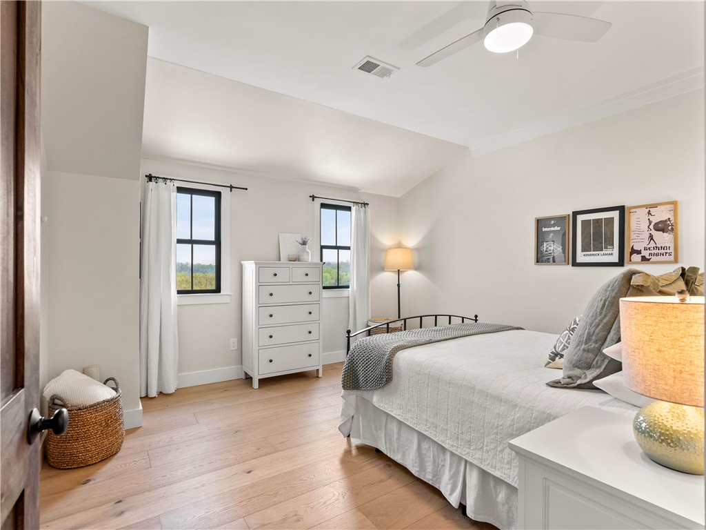 331 Bakerville Road Easley, SC 29642 - Photo 28 of 43 This bright and airy bedroom features beautiful hardwood flooring and ample natural light.