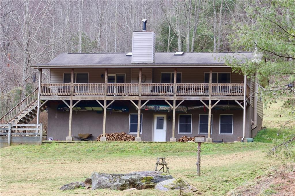 951 Price Town Road Clyde, NC 28721 - Photo 1 of 36 front view of a house with a yard