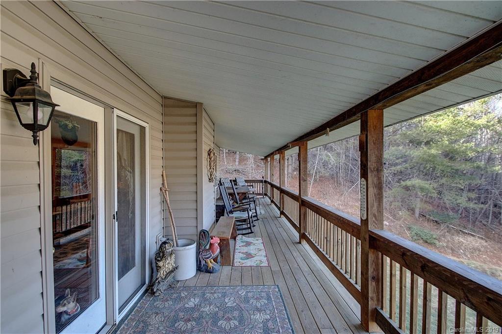 951 Price Town Road Clyde, NC 28721 - Photo 17 of 36 a view of two chairs in the balcony