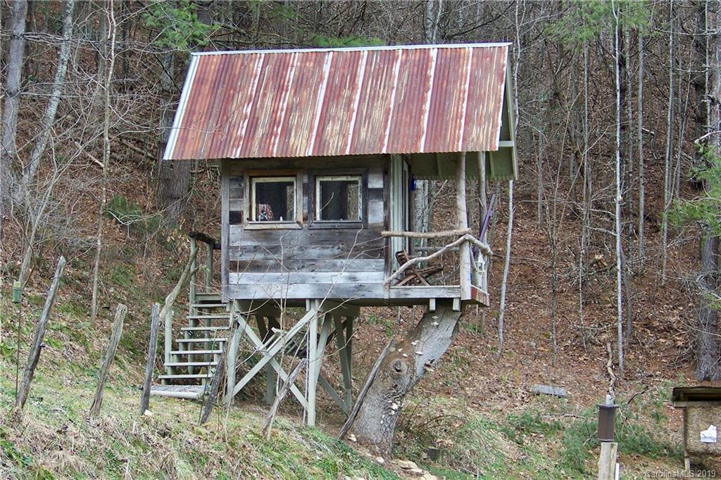 951 Price Town Road Clyde, NC 28721 - Photo 19 of 36 a aerial view of a house with balcony