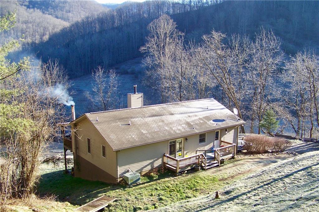 951 Price Town Road Clyde, NC 28721 - Photo 36 of 36 an aerial view of a house with yard and seating space
