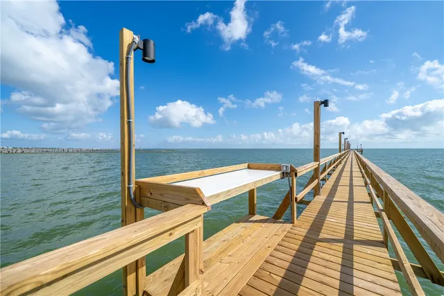 a view of a balcony with chairs