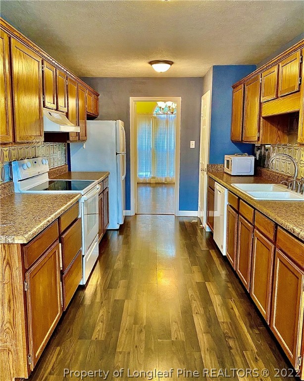407 Larchmont Road Fayetteville, NC 28311 - Photo 8 of 16 a view of a kitchen with stainless steel appliances granite countertop a sink and cabinets