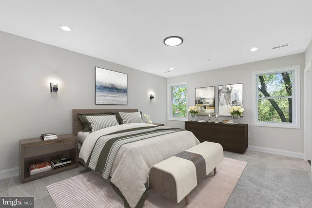 a bed room with a bed and a couch