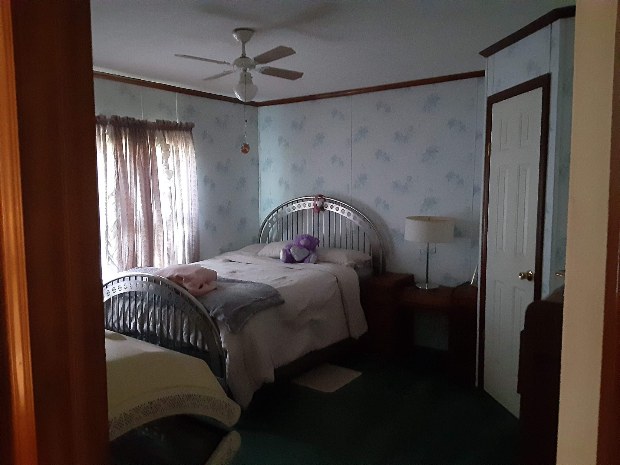 3444 Maxie Jones Road Springfield, TN 37172 - Photo 13 of 15 a bedroom with a bed and a chandelier