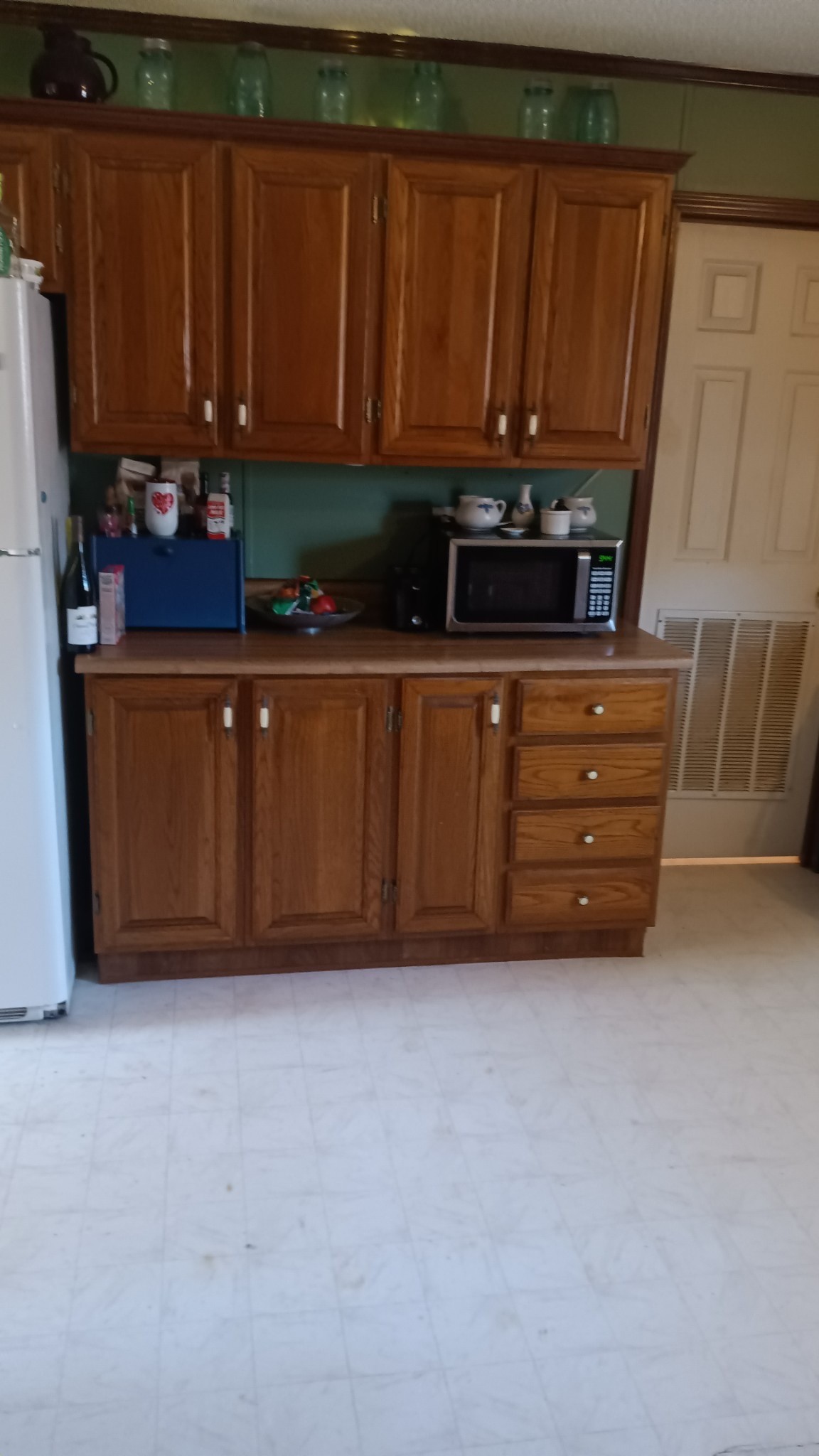 3444 Maxie Jones Road Springfield, TN 37172 - Photo 6 of 15 a view of kitchen with wooden cabinets