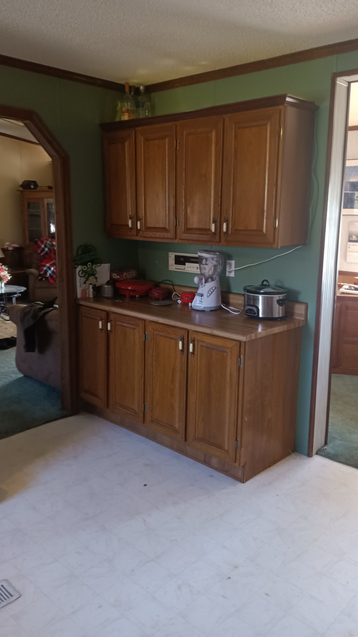 3444 Maxie Jones Road Springfield, TN 37172 - Photo 8 of 15 a room with granite countertop cabinets and washing machine