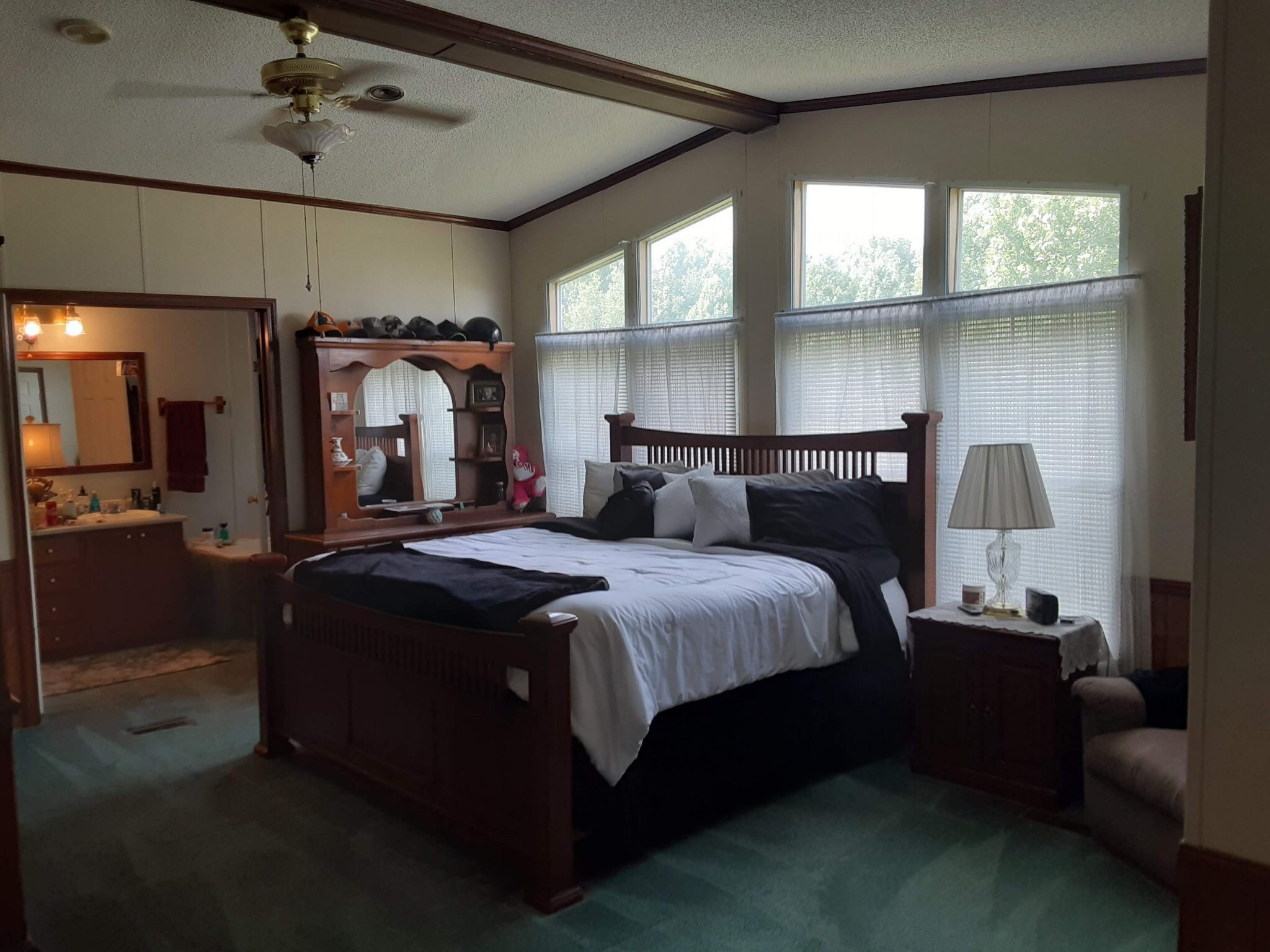 3444 Maxie Jones Road Springfield, TN 37172 - Photo 10 of 15 a bedroom with a bed and a chandelier
