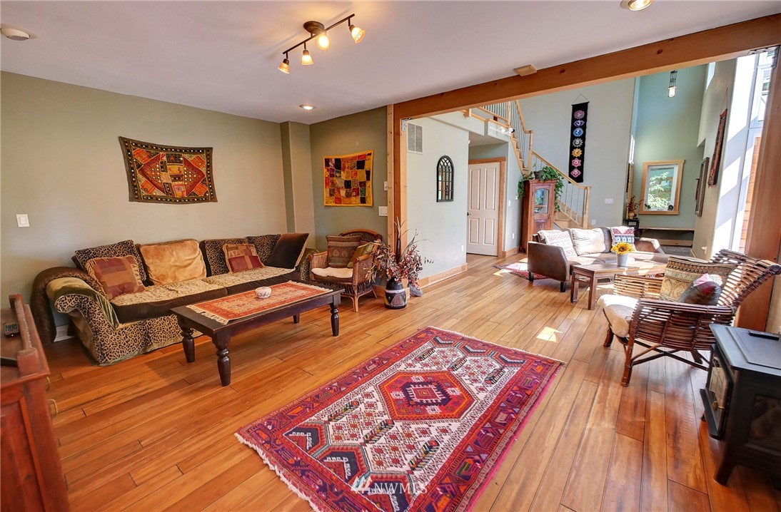 41 Trillium Road Winthrop, WA 98862 - Photo 12 of 39 a living room with furniture and a wooden floor