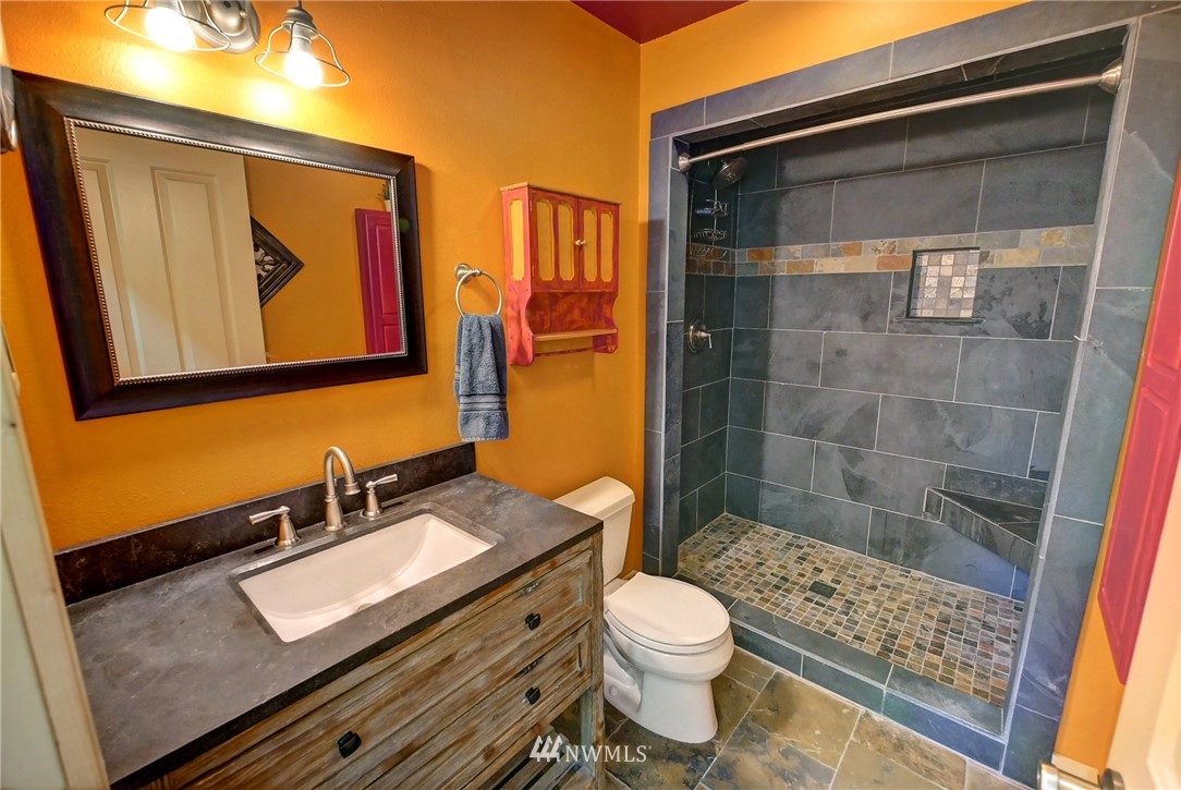 41 Trillium Road Winthrop, WA 98862 - Photo 18 of 39 a bathroom with a sink a toilet and shower